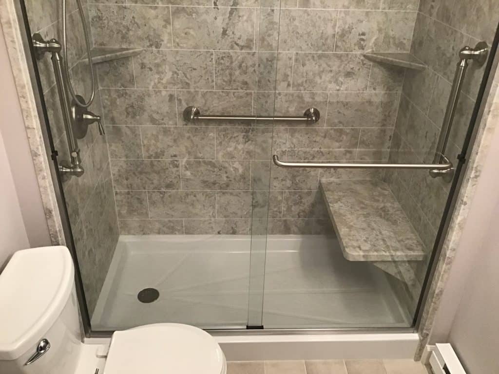 After a fiberglass bath tub removal to shower conversion