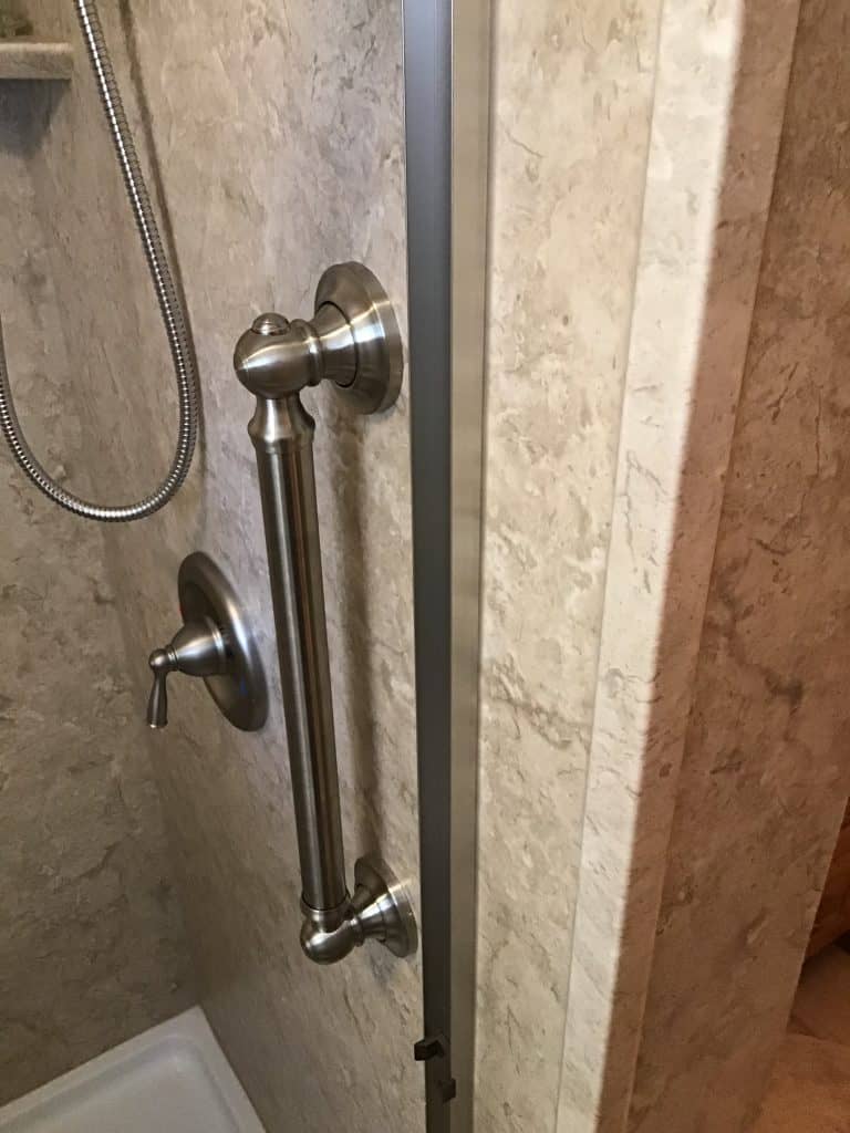 https://bathrenew.com/wp-content/uploads/2021/11/Bathroom-Shower-Grab-Bars-1-768x1024.jpg